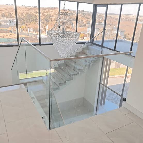 Glass Balustrade TopRail Glass balustrade with stainless steel top rail